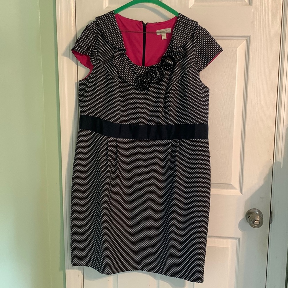 Knee length + short sleeve dress w/ 3 roses. Can be professional or for fun!